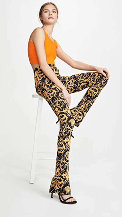 Shop Versace Trouseraloni Jersey Trousers In F.do Nero & Stampa