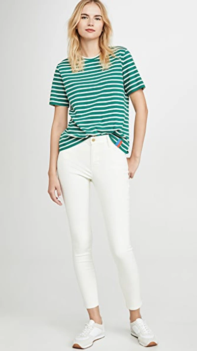Shop Frame Le High Skinny Jeans In Off White Coated