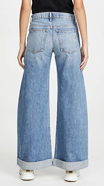 Shop Khaite Noelle Wide Leg Rolled Jeans In Santa Cruz