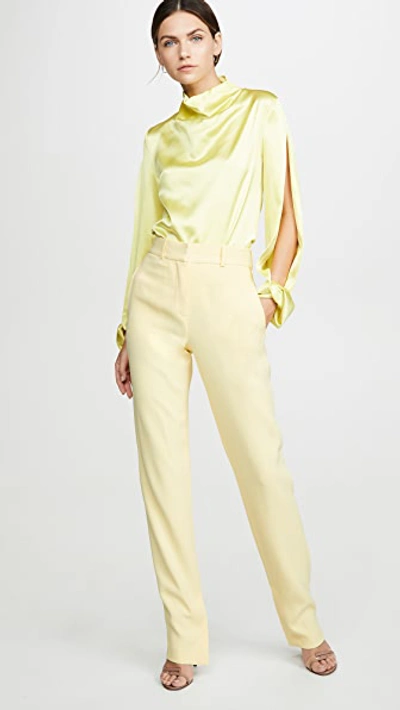 Shop Dion Lee Cady Vented Trousers In Lemon