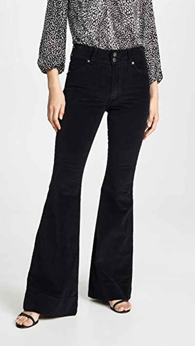 Shop Alice And Olivia Beautiful Exposed Button Bell Jeans In Black