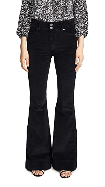 Shop Alice And Olivia Beautiful Exposed Button Bell Jeans In Black