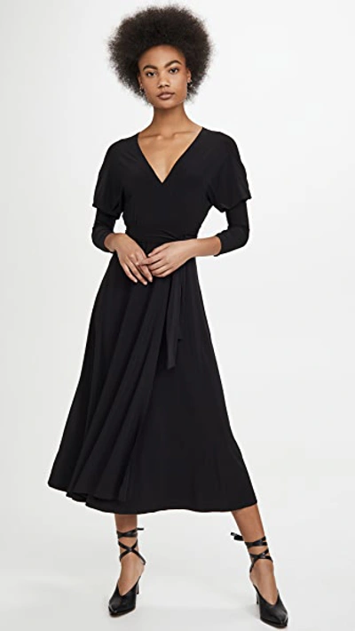 Shop Norma Kamali Dolman Wrap Flared Dress In Black