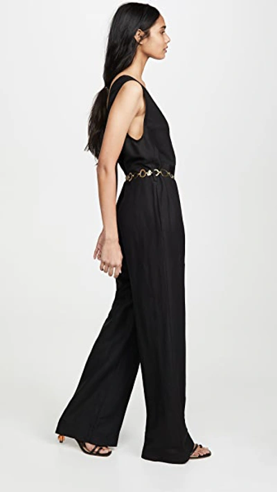 Shop Solid & Striped Linen Jumpsuit In Black