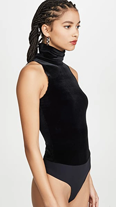 Shop Commando Velvet Sleeveless Turtleneck Bodysuit In Black