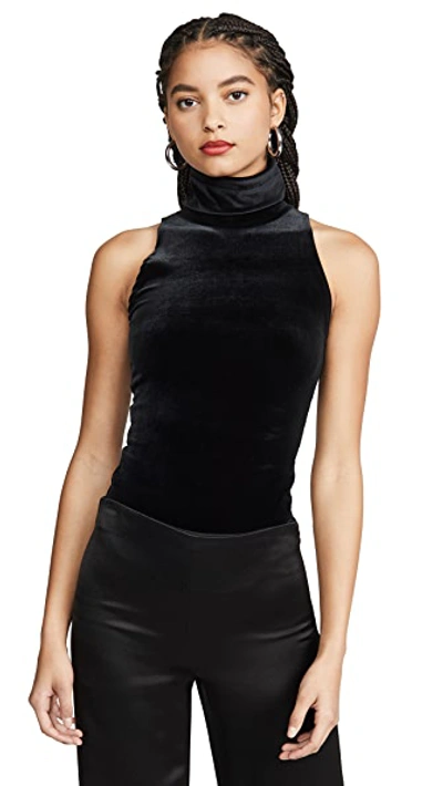 Shop Commando Velvet Sleeveless Turtleneck Bodysuit In Black