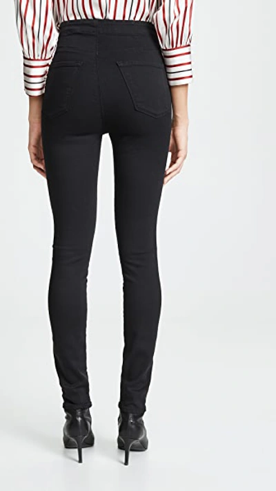 Shop J Brand Natasha Sky Skinny Jeans In Seriously Black