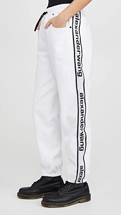 Shop Alexander Wang Denim Track Pants In Optic White