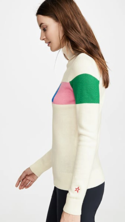 Perfect Moment Intarsia Merino Wool Turtleneck Sweater In Snow White/peach Pink Rainbow