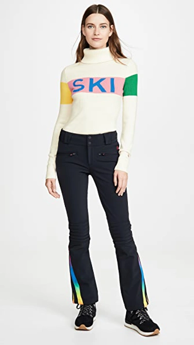Perfect Moment Intarsia Merino Wool Turtleneck Sweater In Snow White/peach Pink Rainbow