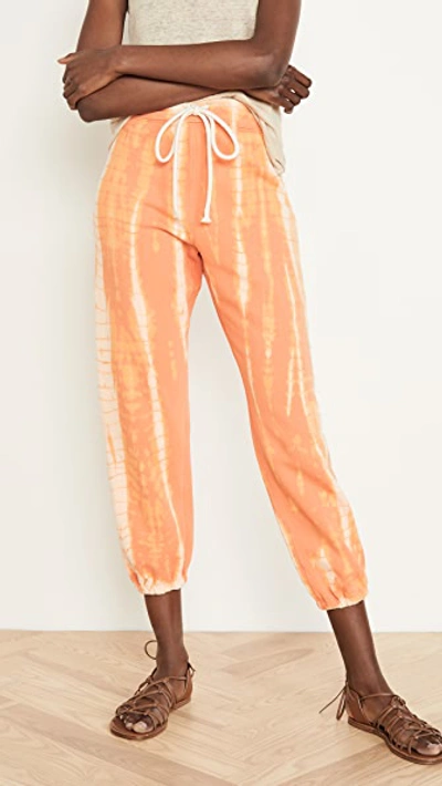 Shop Raquel Allegra Tie Dye Sweat Pants In Orange Tie Dye