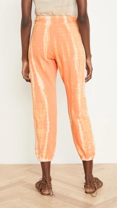 Shop Raquel Allegra Tie Dye Sweat Pants In Orange Tie Dye