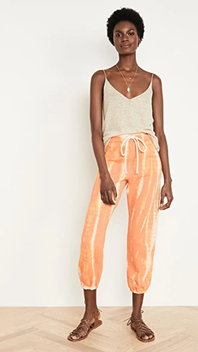 Shop Raquel Allegra Tie Dye Sweat Pants In Orange Tie Dye
