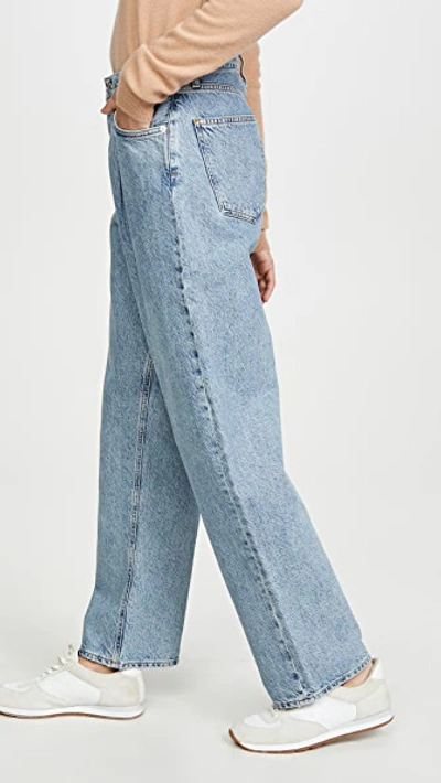 Shop Agolde Mid Rise Pleated Baggy Jeans In Sweetener