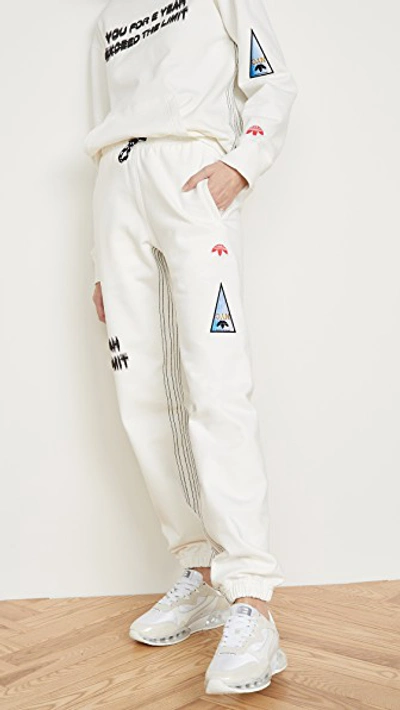 Shop Adidas Originals By Alexander Wang Graphic Joggers In Core White