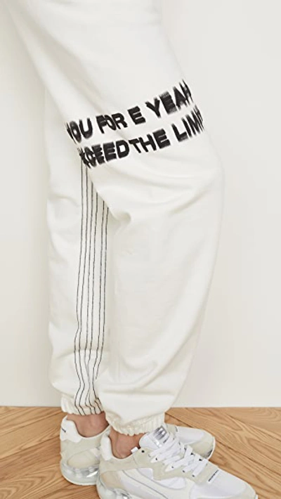 Shop Adidas Originals By Alexander Wang Graphic Joggers In Core White