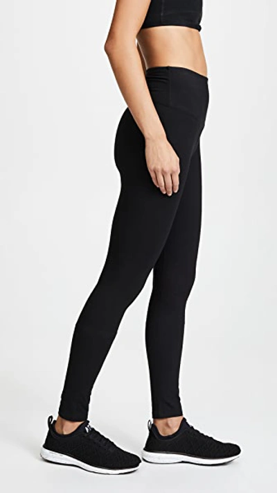 Shop Yummie Milan Leggings In Black