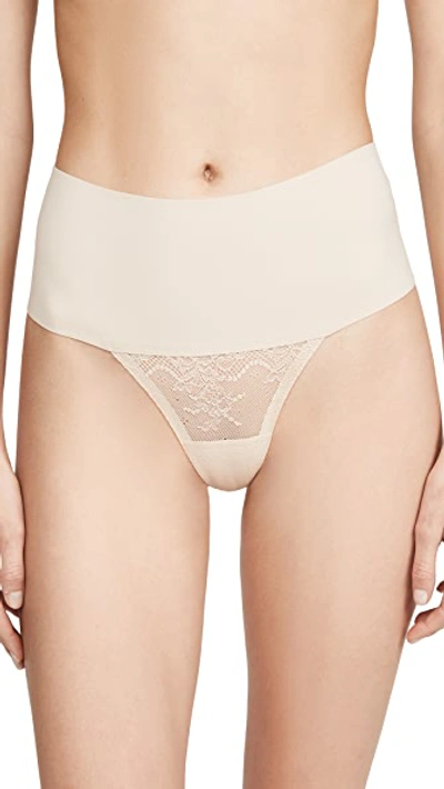 Shop Spanx Undie-tectable Lace Thong In Soft Nude