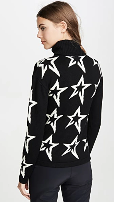 Perfect Moment Star Dust Intarsia Merino Wool Turtleneck Sweater In Black/snow White Star