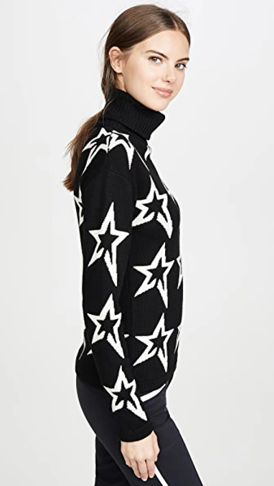Perfect Moment Star Dust Intarsia Merino Wool Turtleneck Sweater In Black/snow White Star