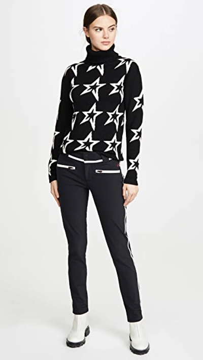 Perfect Moment Star Dust Intarsia Merino Wool Turtleneck Sweater In Black/snow White Star