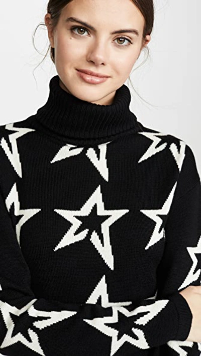 Perfect Moment Star Dust Intarsia Merino Wool Turtleneck Sweater In Black/snow White Star