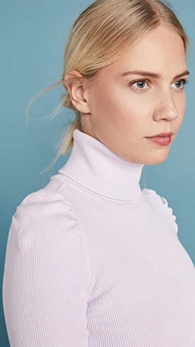 Shop Amo Puff Sleeve Turtleneck Top In Lilac