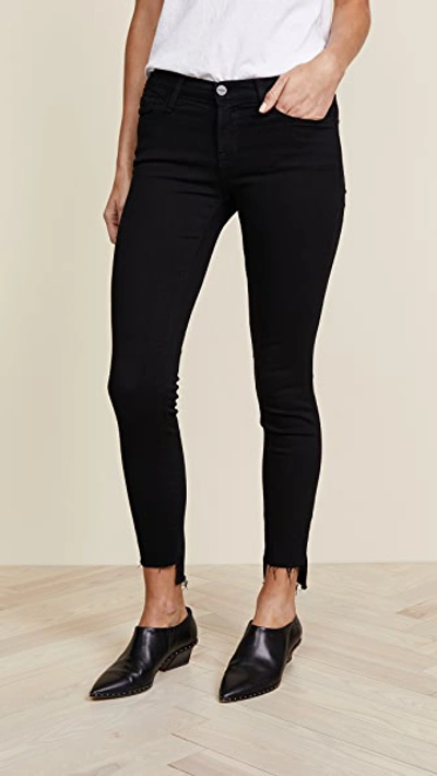 Shop Frame Le Skinny De Jeanne Stagger Hem Jeans In Film Noir