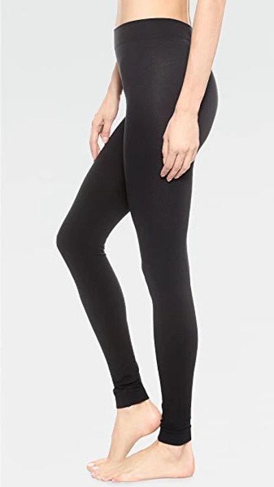 Shop Wolford Velvet 100 Leg Support Footless Tights In Black