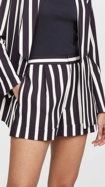 Shop Alice And Olivia Conry Pleated Cuff Shorts In Moondust Stripe Black