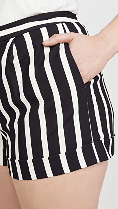 Shop Alice And Olivia Conry Pleated Cuff Shorts In Moondust Stripe Black