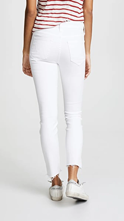 Shop Mother The Stunner Zip Ankle Step Fray Jeans In Glass Slipper