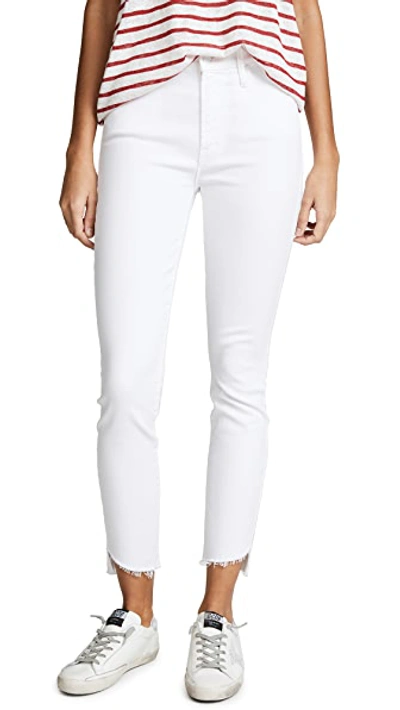Shop Mother The Stunner Zip Ankle Step Fray Jeans In Glass Slipper