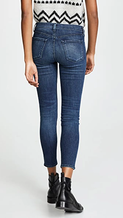 Shop J Brand 835 Mid Rise Crop Skinny Jeans In Swift