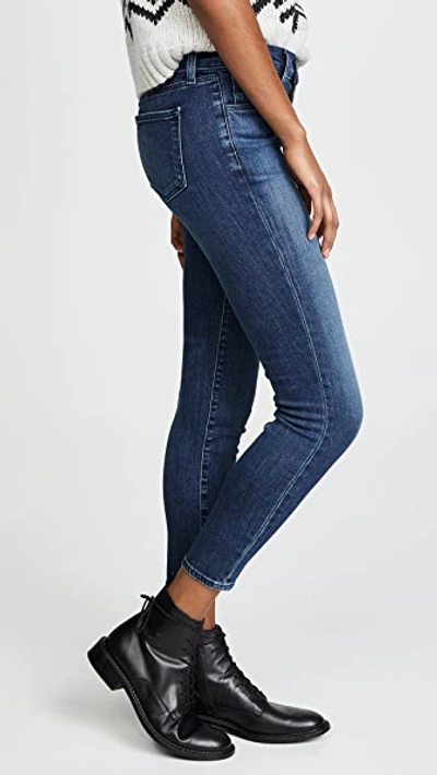Shop J Brand 835 Mid Rise Crop Skinny Jeans In Swift