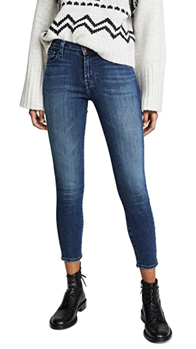 Shop J Brand 835 Mid Rise Crop Skinny Jeans In Swift