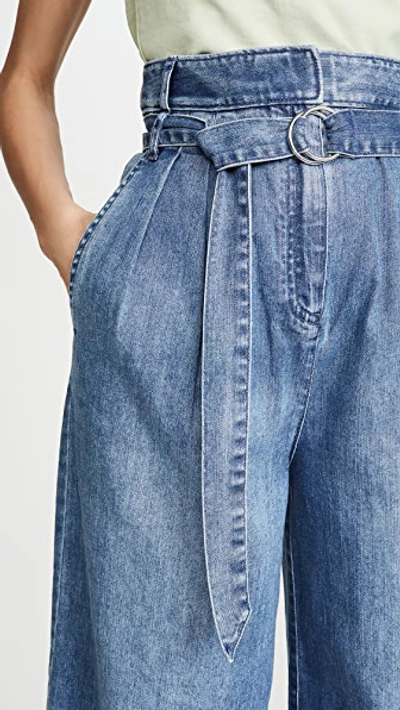 Shop Tibi Stella Full Length Jeans In Vintage Stone Wash