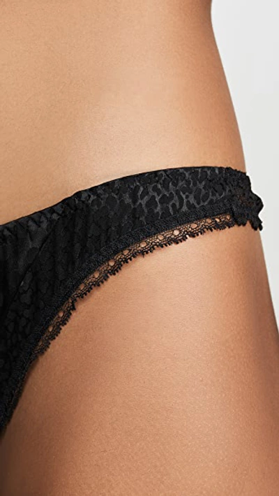 Shop Stella Mccartney Camellia Daring Thong In Black