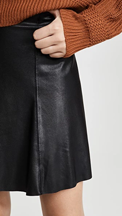 Shop Spanx Faux Leather Skater Skirt In Very Black