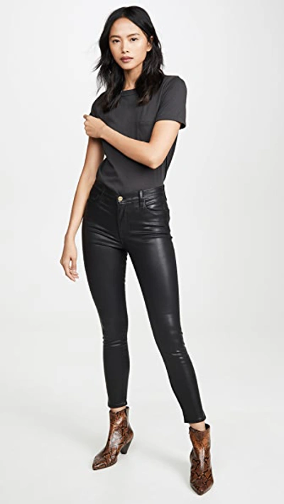 Shop Frame Le High Skinny Coated Jeans In Noir Coated