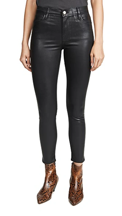 Shop Frame Le High Skinny Coated Jeans In Noir Coated