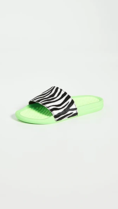 Shop Apl Athletic Propulsion Labs Iconic Calf Hair Slides In Neon Green/zebra