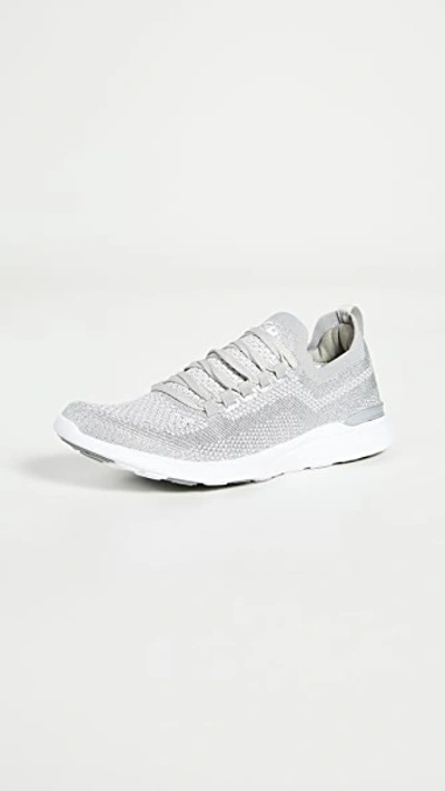 Shop Apl Athletic Propulsion Labs Techloom Breeze Sneakers In Met Silver/blchd Pink/white