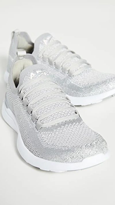 Shop Apl Athletic Propulsion Labs Techloom Breeze Sneakers In Met Silver/blchd Pink/white
