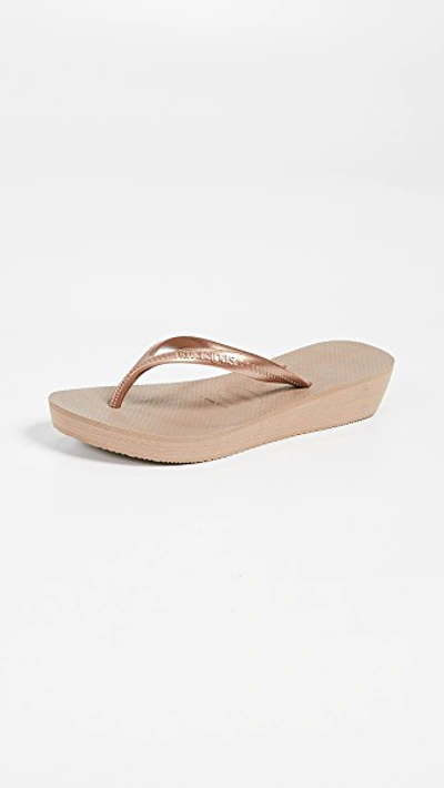 Shop Havaianas High Light Wedge Flip Flops In Rose Gold