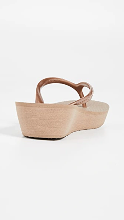 Shop Havaianas High Light Wedge Flip Flops In Rose Gold