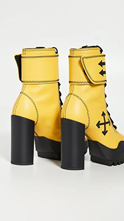 Shop Off-white Arrow Heeled Moto Wrap Boots In Yellow/black