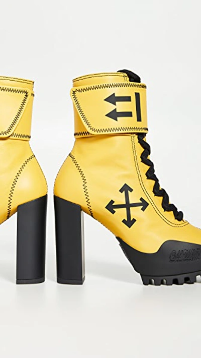 Shop Off-white Arrow Heeled Moto Wrap Boots In Yellow/black