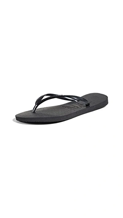 Shop Havaianas Slim Flip Flops In Black