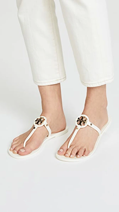 Shop Tory Burch Mini Miller Flip Flops Ivory